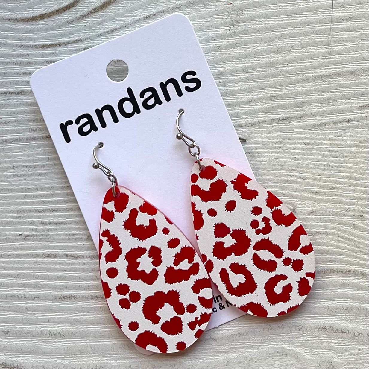 Red and white leopard dangle earrings